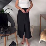 Pantaloni casual asimmetrici a tinta unita