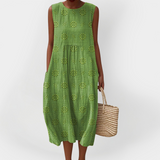 Abito elegante in cotone senza maniche con tasche