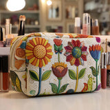 Beauty case trapuntato a fiori