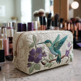 Beauty case trapuntato con colibrì e fiori