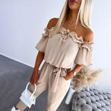 Nicoletta - Tuta elegante con spalle scoperte e laccio in vita