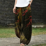 Camilla - Pantaloni larghi verde scuro con motivo botanico