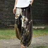 Delfina - Pantaloni larghi bianchi a fiori